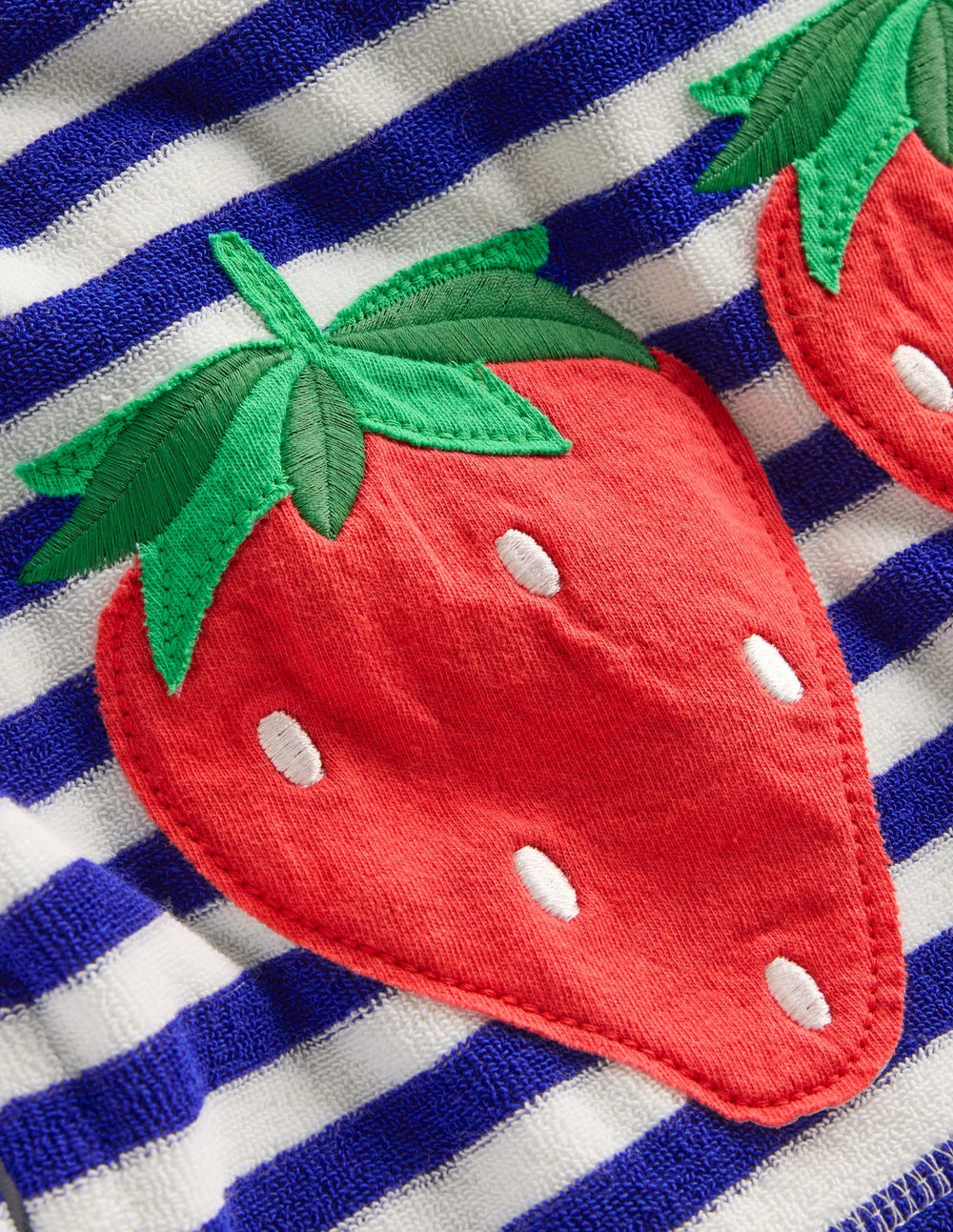 Mara Towelling Throw - On - Bright Blue Fruit Stripe